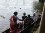Cross-river taxi for some of our traveling companions (90kb)